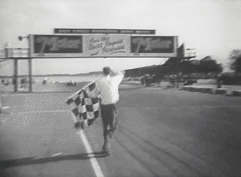 takes checkered flag